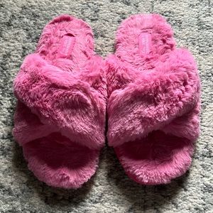 Pink fuzzy slippers